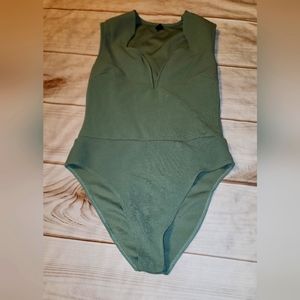 Green body suit